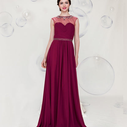 A beautiful gown, halter top with that see through peek-a-boo.