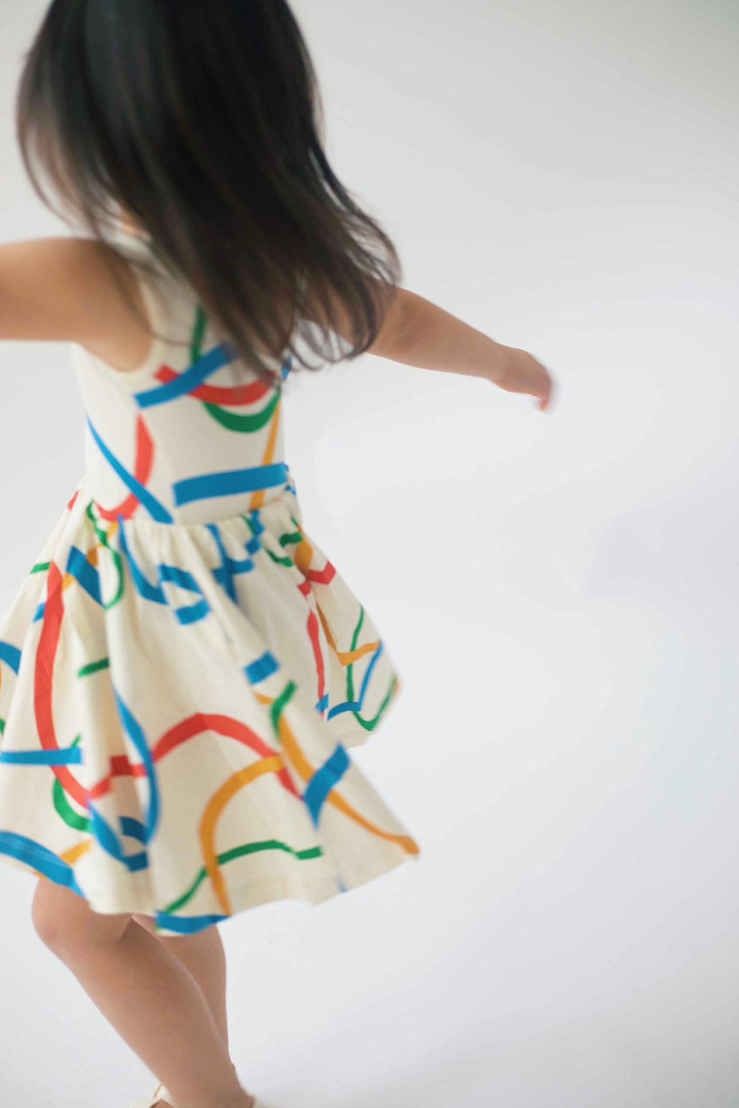 Sleeveless Twirl Dress in Wavy Lines