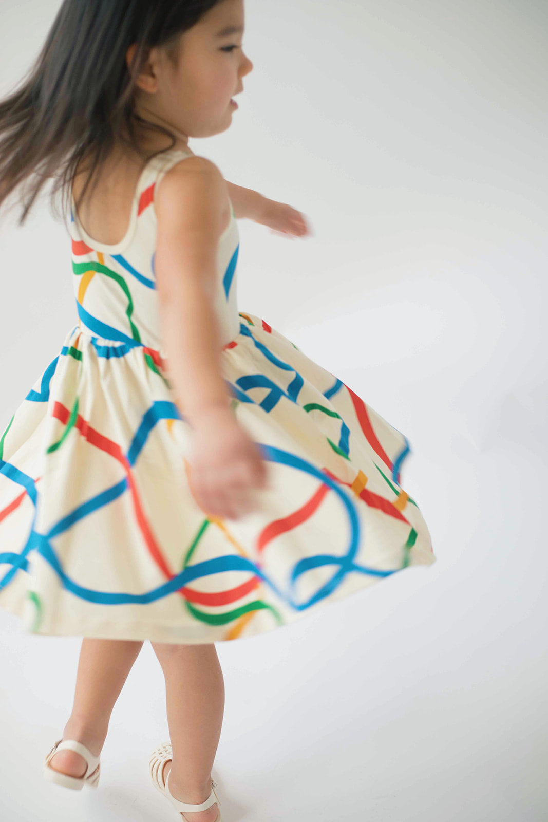 Sleeveless Twirl Dress in Wavy Lines