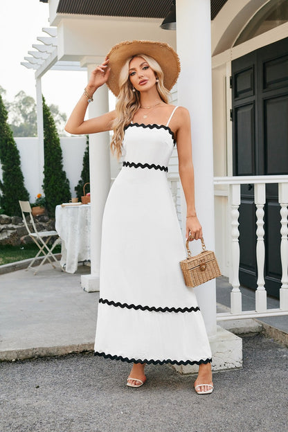 Women's long sleeveless dress with suspenders and pleated lace