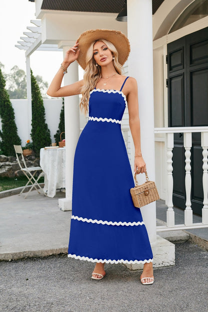 Women's long sleeveless dress with suspenders and pleated lace