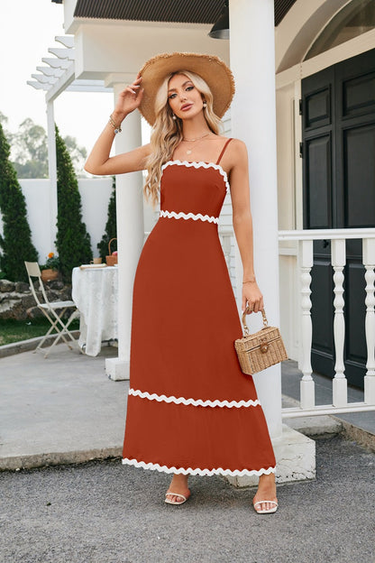 Women's long sleeveless dress with suspenders and pleated lace