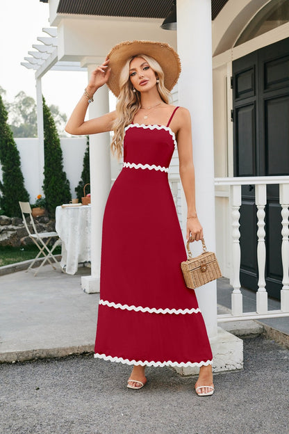 Women's long sleeveless dress with suspenders and pleated lace