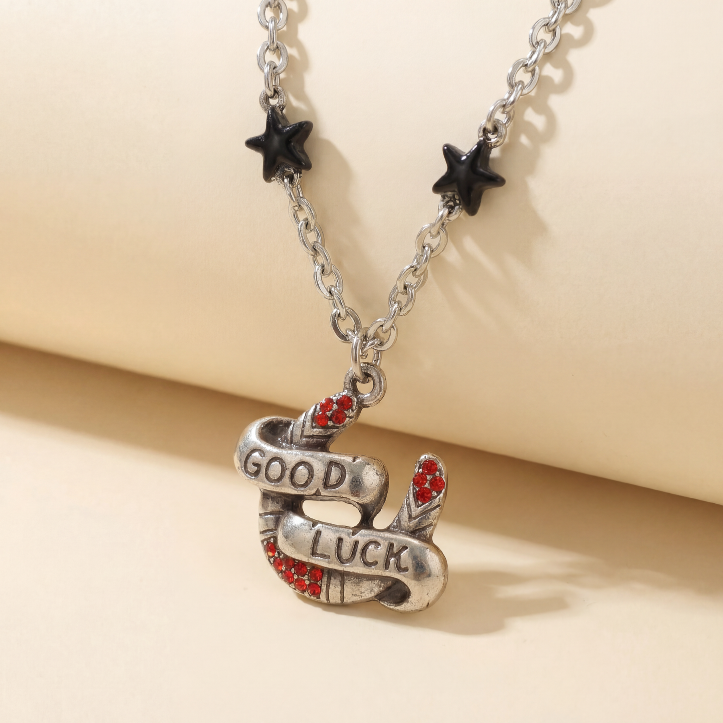 Sourpuss "Good Luck” Horseshoe Necklace with Red Rhinestones & Black Star Charms